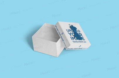 Mockup Featuring an Open Gift Box Placed Over a Solid Color Surface 3456-el1