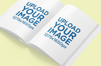 Mockup of an Open Magazine on a Plain Surface 3377-el1