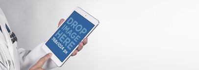 White iPad Mini Used by a Doctor Mockup