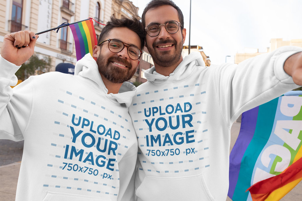 Hoodie Mockup of a Happy Couple Taking a Selfie at a Pride Parade