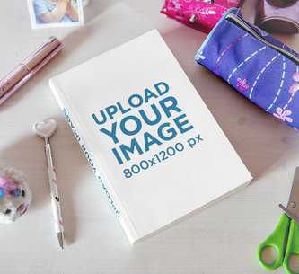 Mockup of a Paperback Book Surrounded by Girly Stuff 3449-el1