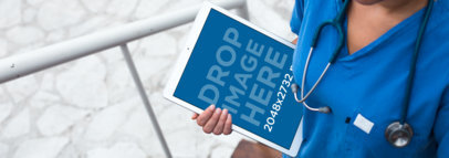 White iPad Pro Mockup Held by a Medical Doctor a12413wide