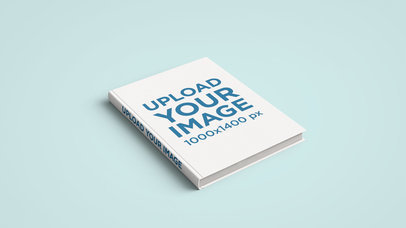 Minimal Mockup Featuring a Hardcover Book Lying Over a Plain Color Surface 2427-el1