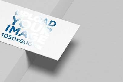 Mockup of a Varnish Business Card Balanced on a Border 33775