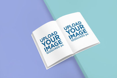 Mockup of a Hardcover Book Placed Over a Two-Color Surface 