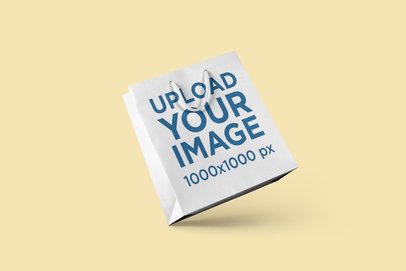 Mockup of a Squared Gift Bag Balancing on One Corner 3491-el1