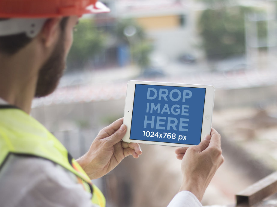 iPad Mini Mockup of an Onsite Construction Worker