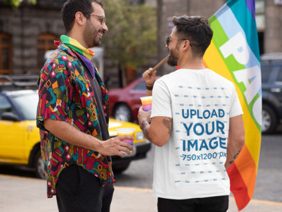 Back View T-Shirt Mockup Featuring a Tattooed Man Drinking on the Street