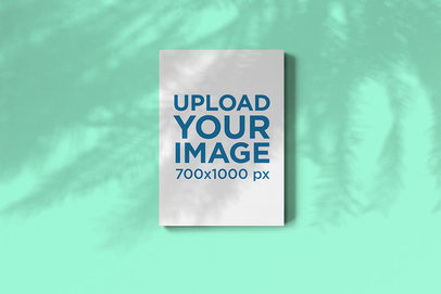 Mockup of a Magazine Under the Shade of a Palm Tree 2460-el1