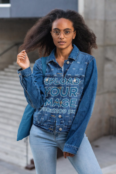 Denim Jacket Mockup of a Young Woman Touching Her Hair 