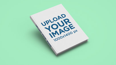 Book Mockup Featuring a Customizable Spine and a Solid Color Backdrop
