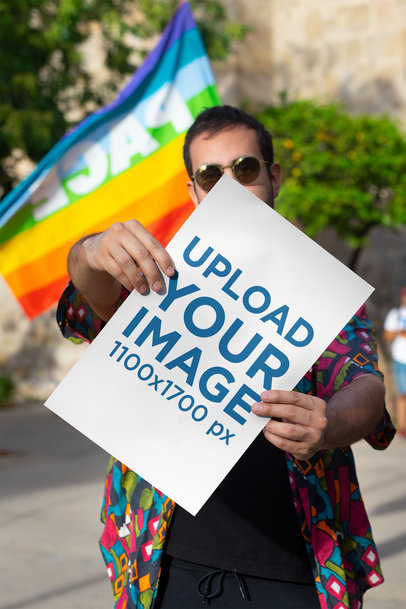 Mockup Featuring a Man Showing a Poster at the Pride Parade