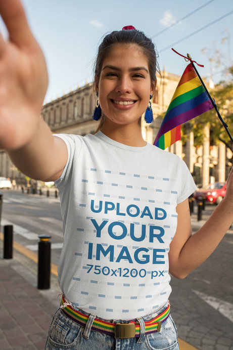 Selfie Mockup Featuring a Woman with a Crewneck T-Shirt Holding a Rainbow Flag