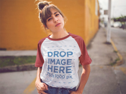 Raglan T-Shirt Mockup Featuring a Trendy Girl in the Street a12479a