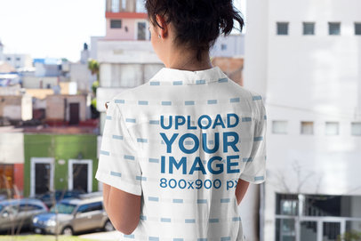 Back View Mockup of a Woman Wearing a Button-Up Shirt by a Window 