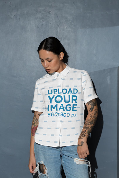 Button-Up Shirt Mockup of a Woman Posing by a Gray Wall 33145