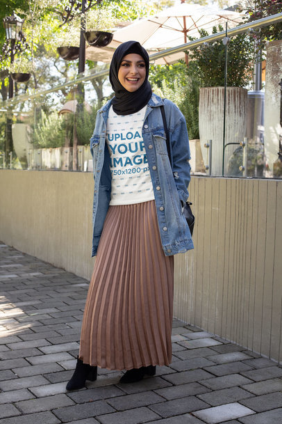 T-Shirt Mockup of a Woman with a Hijab on the Street