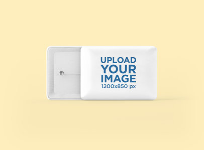 Mockup of a Rectangular Pin Button Lying Over Another One 3529-el1