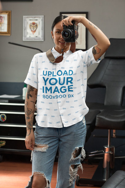 Button up Shirt Mockup Featuring a Woman Taking a Picture With a Vintage Camera 33148