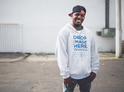 Zip Up Hoodie Mockup Featuring a Young Man Wearing a Snapback