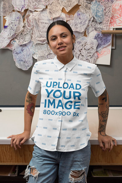 Button-Up Shirt Mockup of a Woman Leaning on a Desk