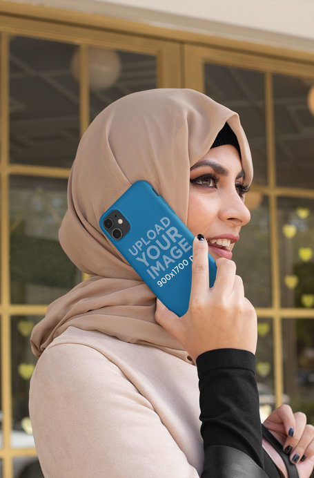 Phone Case Mockup Featuring a Woman with a Hijab Talking on the Phone 