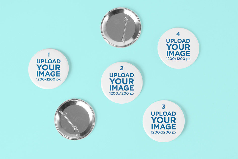 Mockup of a Bunch of Pin Buttons on a Plain Surface 