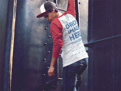 Raglan T-Shirt Mockup of a Young Man Climbing a Black Ladder