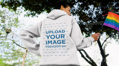 Hoodie Video of a Short-Haired Woman Waving an LGBTQ Flag