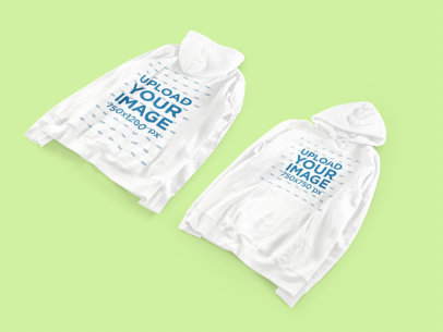 Front and Back Hoodie Mockup Featuring a Customizable Flat Surface