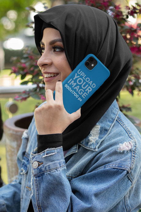 Phone Case Mockup Featuring a Woman Talking on the Phone Outside