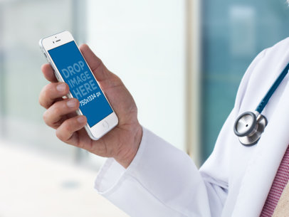 Mockup of a Doctor's Hand Holding an iPhone