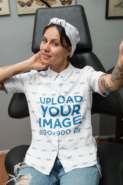 Button-Up Shirt Mockup of a Woman Taking a Selfie in a Tattoo Studio 33153
