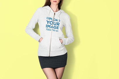 Mockup of a Woman at a Studio with Her Hands in the Pockets of her Hoodie
