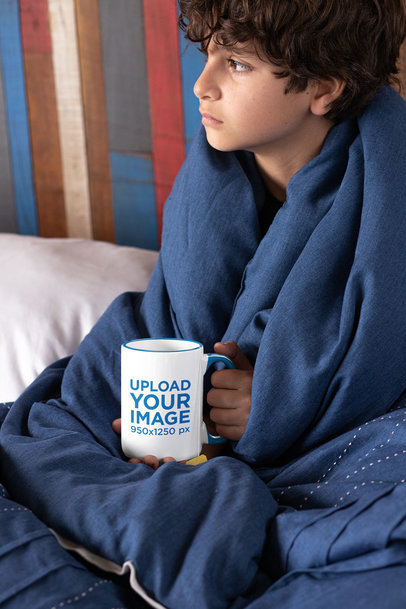 15 oz Colored Rim Mug Mockup of a Boy Covered with a Quilt 33169