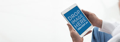 iPad Mini Mockup of a Senior Doctor at a Hospital