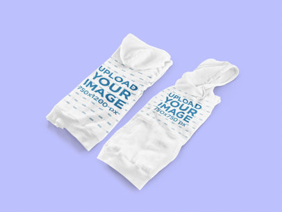 Mockup of Two Folded Hoodies Next to Each Other