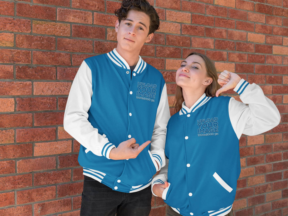 Mockup of a Man and a Woman Wearing Varsity Jackets