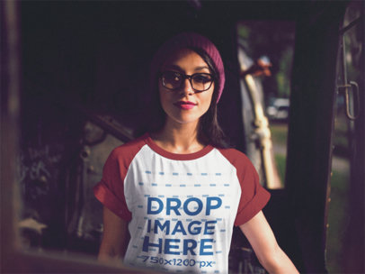 Raglan T-Shirt Mockup of a Cool Woman Wearing Glasses and a Beanie