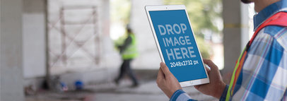 iPad Pro Mockup of a Civil Engineer on a Construction Site a12432