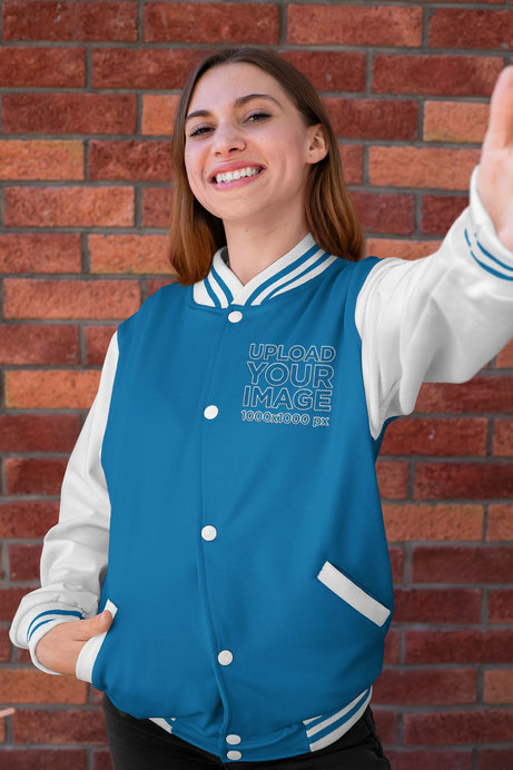 Selfie Mockup Featuring a Joyful Woman Wearing a College Jacket
