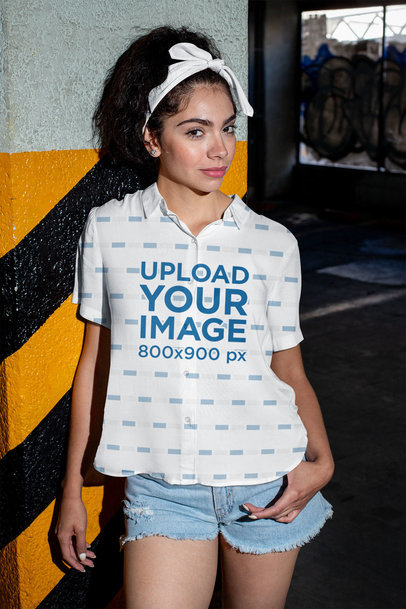 Button-Up Shirt Mockup of a Woman in an Urban Setting