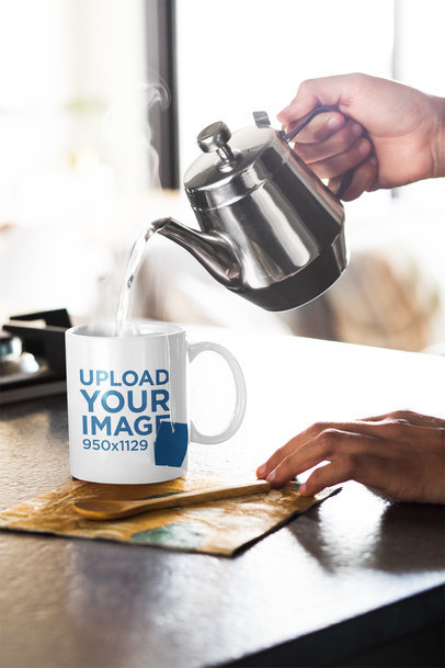 11 oz Mug Mockup of a Person Preparing Hot Tea 33181