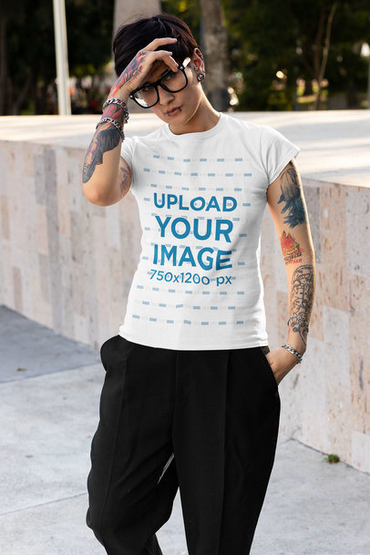 T-Shirt Mockup of a Tattooed Woman with an Androgynous Style
