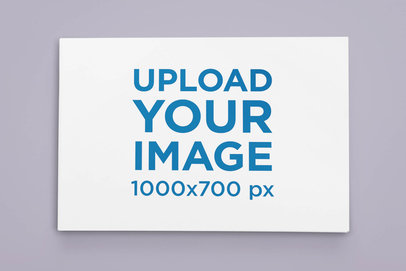 Mockup of a Horizontal Book on a Customizable Backdrop