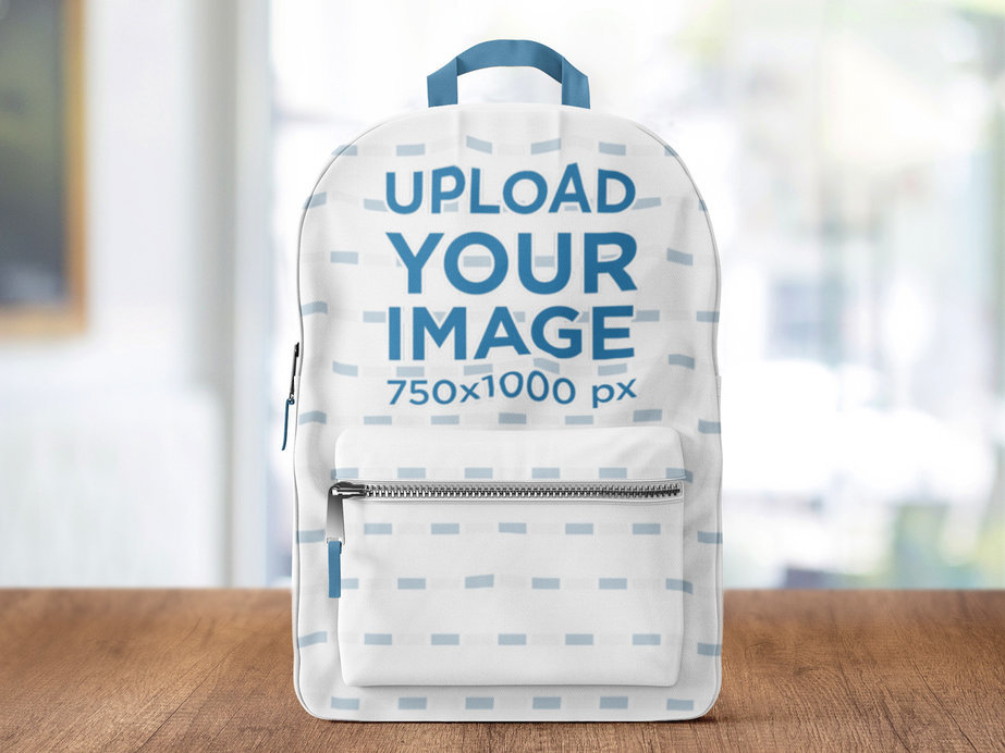 Mockup of a Backpack Placed on a Wooden Table 