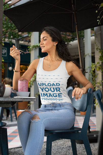 Tank Top Mockup Featuring a Woman Having a Smoothie 