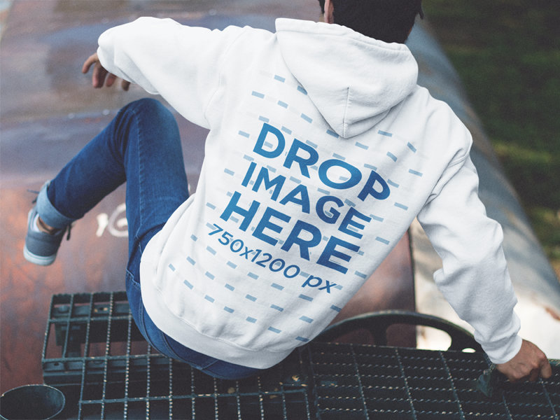 Back Side Hoodie Mockup of a Guy Jumping Off a Train