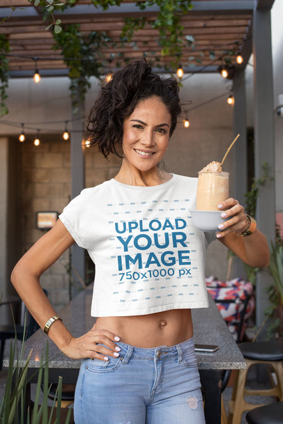 Crop Top Mockup of a Fit Woman Holding a Smoothie