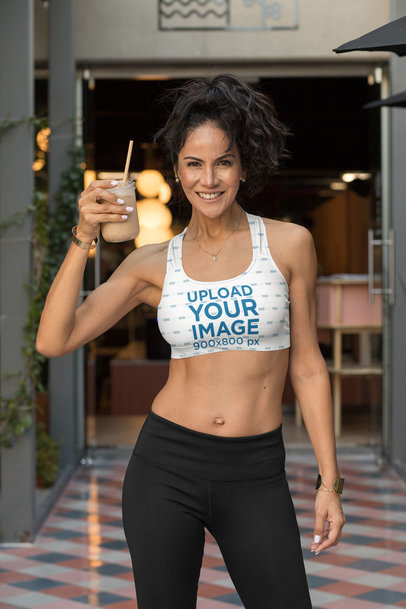 Sports Bra Mockup of a Fit Woman Holding a Smoothie